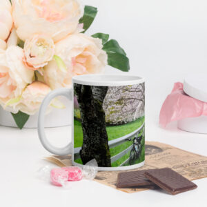 Biking Through Blossoms Glossy Mug