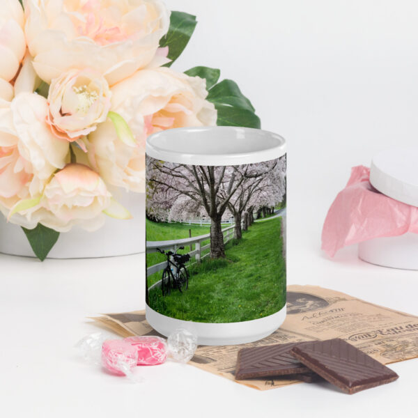 Biking Through Blossoms Glossy Mug - Image 6